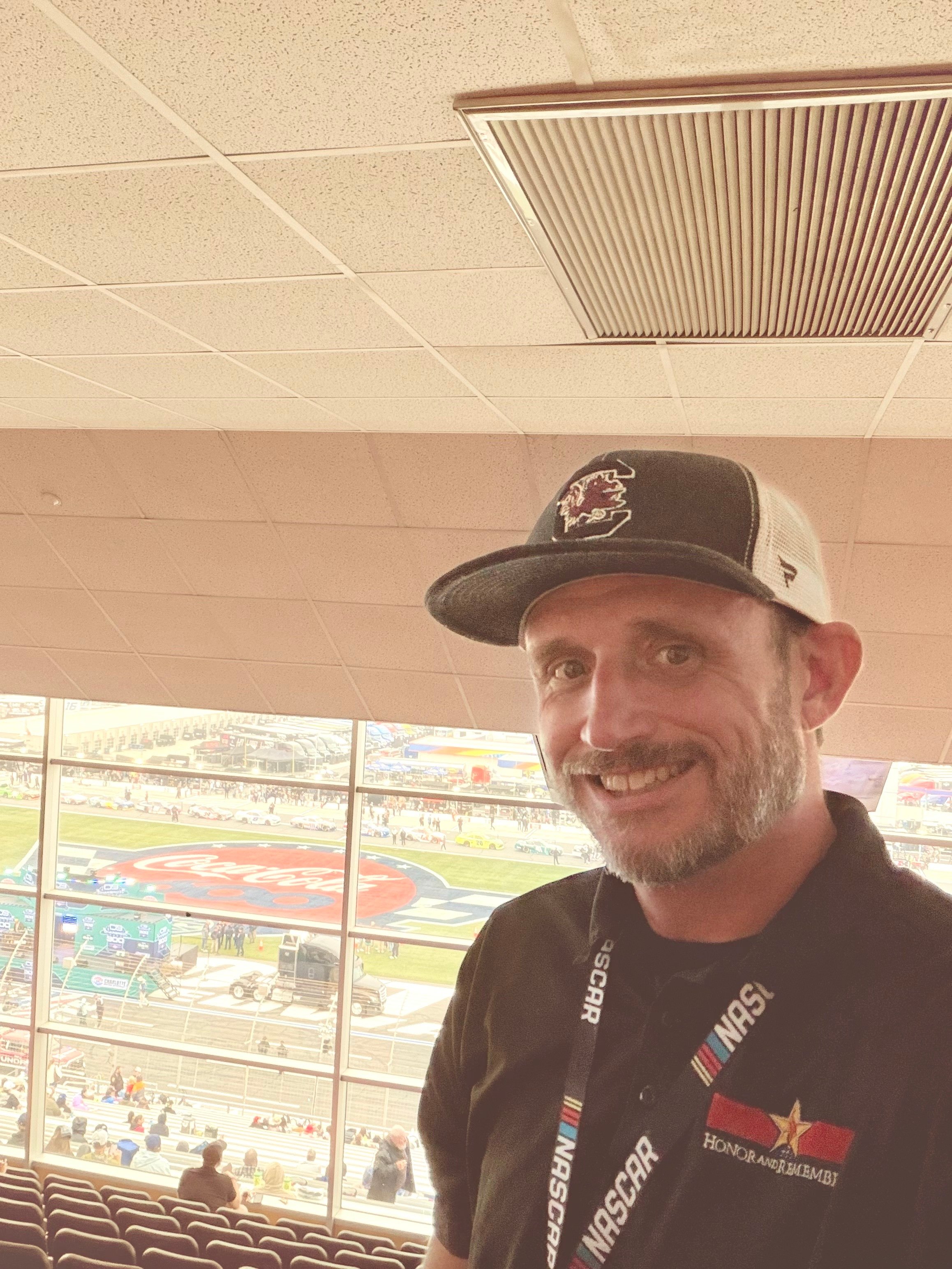 Chris Pollitzer representing Honor and Remember at a NASCAR event