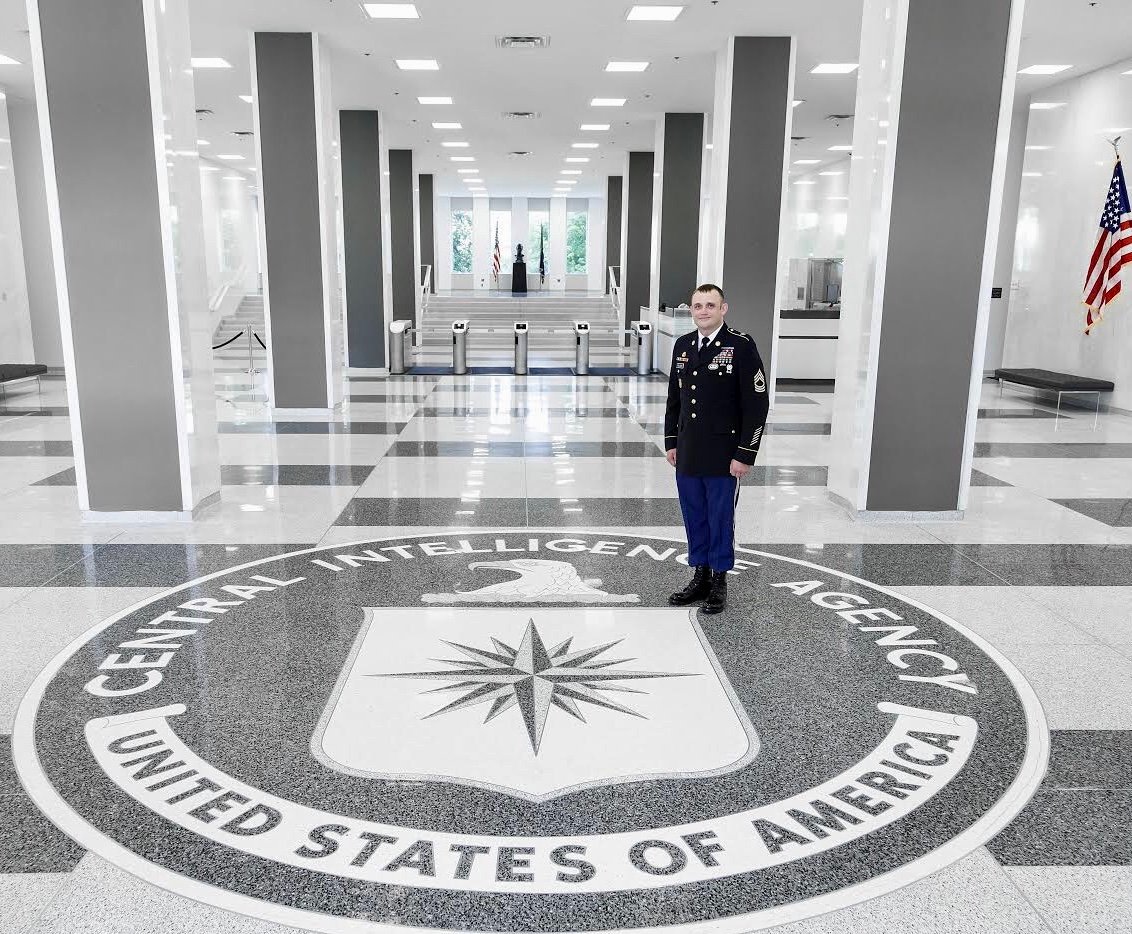 Chris Pollitzer standing inside CIA headquarters